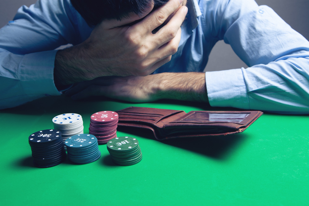Devastated man losing money at casino